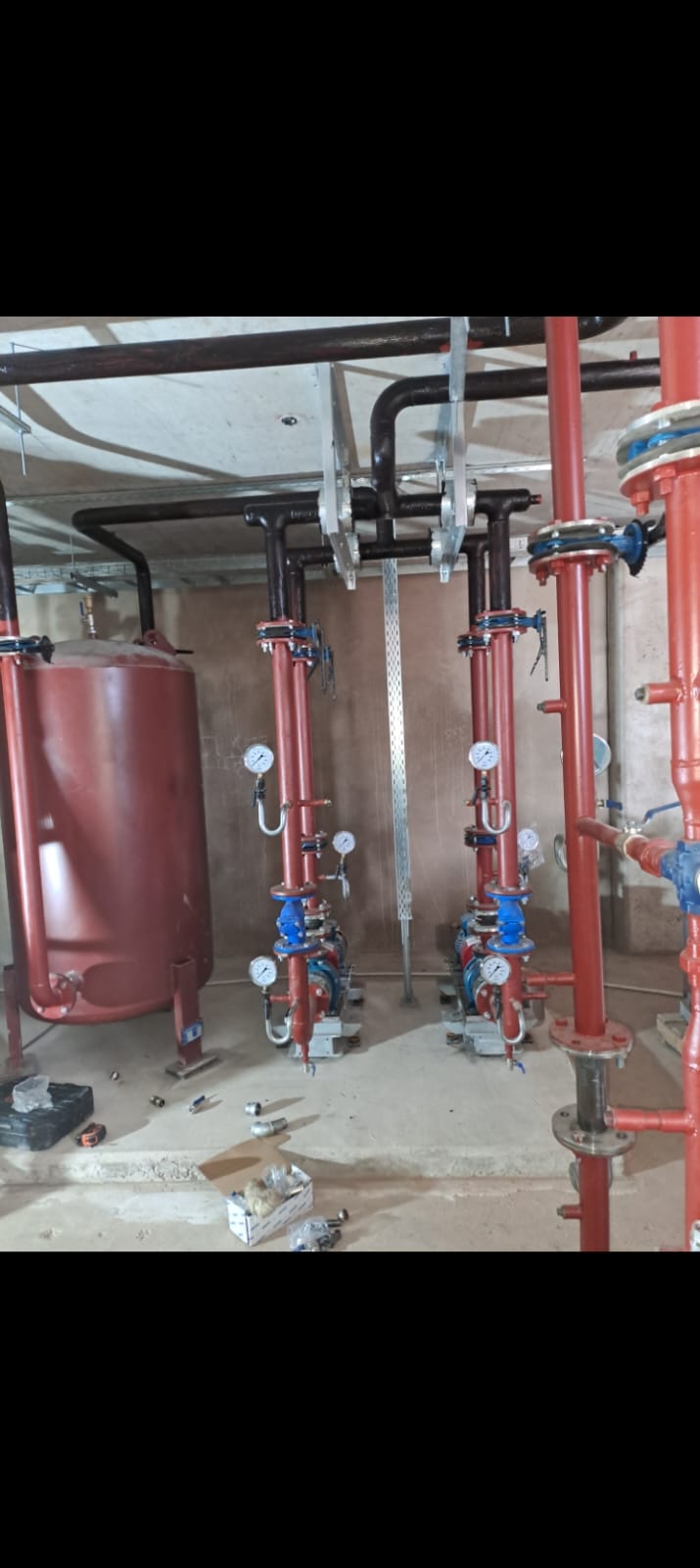 Red chilled water piping with pumps installed by Mshisa Airconditioning