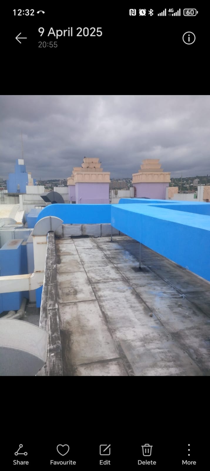 Wide view of blue insulation cladding on rooftop