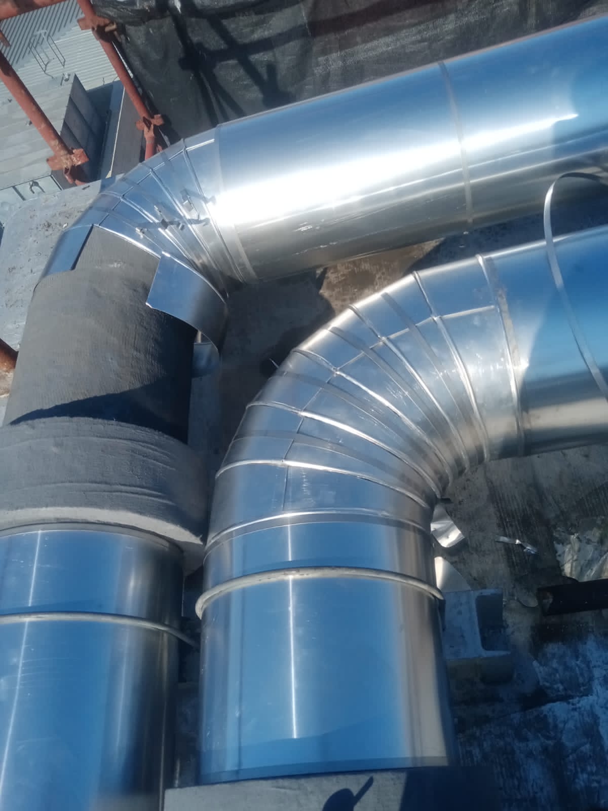 Aluminium cladding on HVAC piping by Mshisa Airconditioning